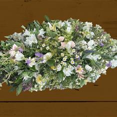 Wild pastel casket spray 